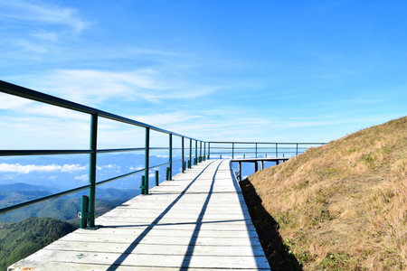 Scenic Mountain Viewpoint with Walkway and Blue Sky at Mae Hong Son, Thailandの写真素材