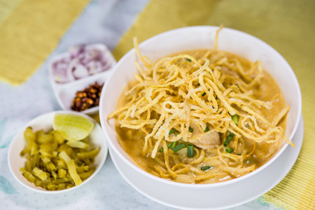 Khao Soi, Yellow noodle in coconut milk curry with chickenの写真素材
