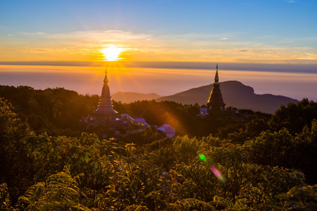 Sun rise at Pagoda on the top of mountain, Inthanon national park, Chiang Mai,Thailandの写真素材