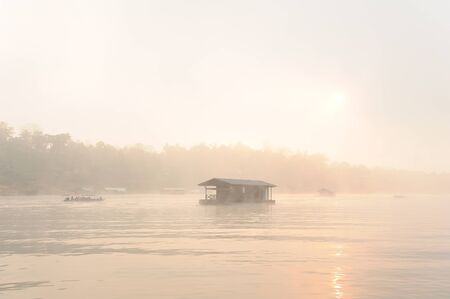 Houseboat on river in Sangklaburi Kanchanaburi country, Thailandの写真素材
