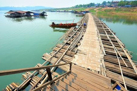 Bridge at sangklaburi Thailand, Mon bridge, second longest wooden bridge in the worldの写真素材