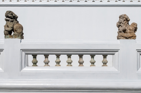Stone Lion sculpture onStone balustrade fence in Royal palace