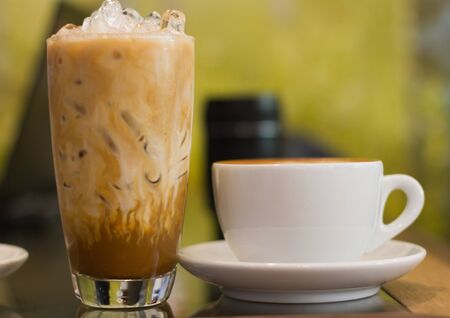 Ice and hot coffee lateの写真素材