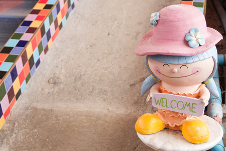 welcome sign with kid statueの写真素材