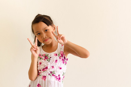 Asian girl kid is expressions of  funnyの写真素材