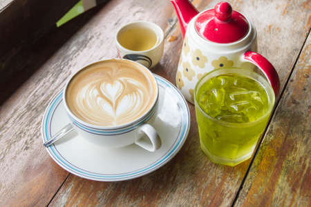 Luxury of coffee latte set on old wooden backgroundの写真素材