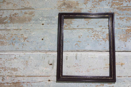 Classic wooden frame on old wooden background
