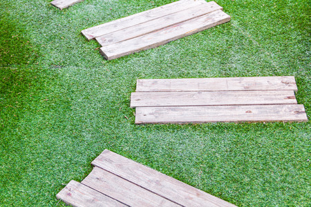 Wood on the grassの写真素材