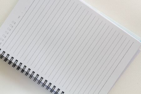 Blank notebook on white paper backgroundの写真素材