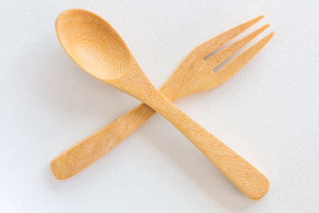 Wooden spoon on White paper backgroundの写真素材