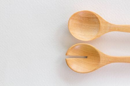 Wooden spoon on White paper backgroundの写真素材