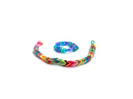 Rainbow loom, Colored rubber bands for weaving accessories isolate white backgroundの写真素材