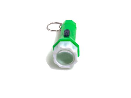 Green flashlight toys isolated on white background. Toys usefulの写真素材