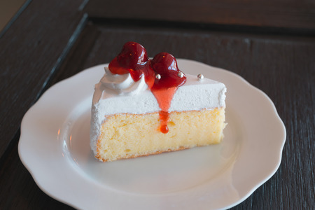 Cherry cake on the table in cafe, Joyful with coffee time concept.