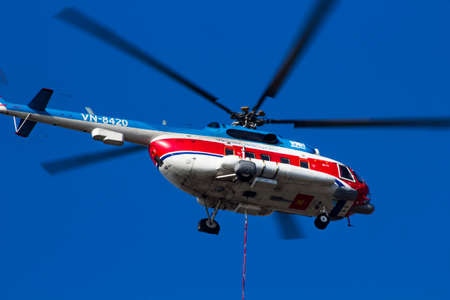 Vietnam People's Airforce Mi-172 Helicopter flying in training excercise.