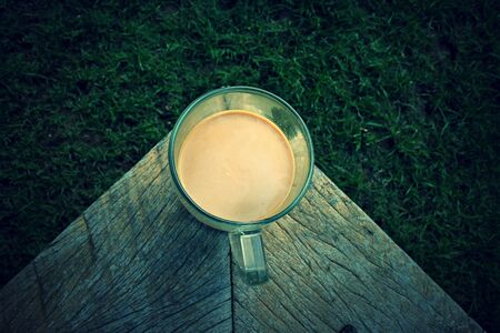 Coffee on old woodの写真素材