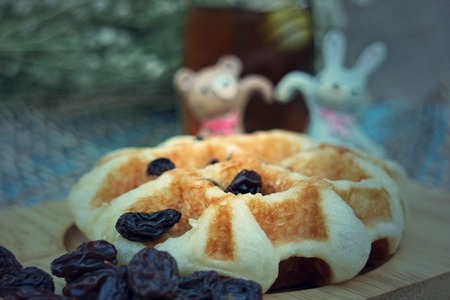 Raisin Waffle on wooden platesの写真素材