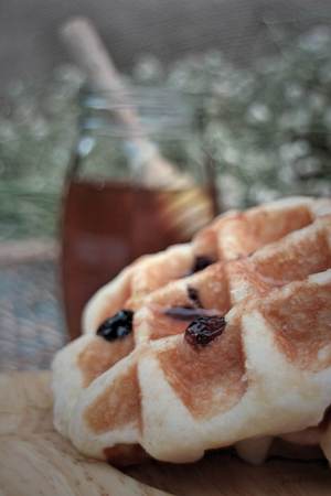 Raisin Waffle on wooden platesの写真素材
