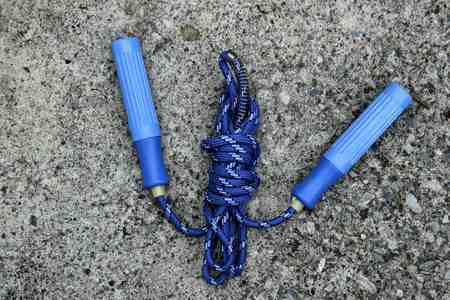 skipping rope for an exercise on cement floorの写真素材