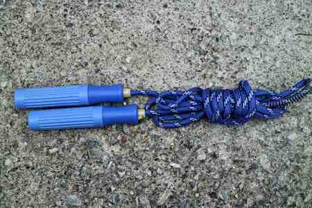 skipping rope for an exercise on cement floorの写真素材