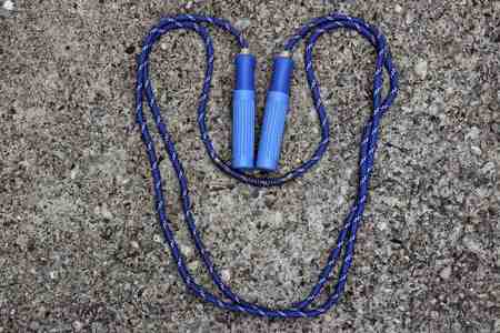 skipping rope for an exercise on cement floor