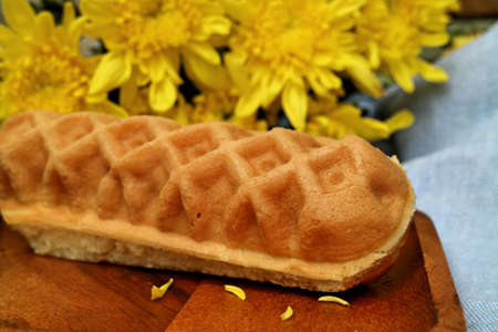 Waffle hotdog on wooden  plates