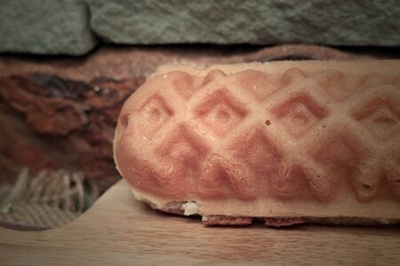 Waffle hotdog on wooden  platesの写真素材