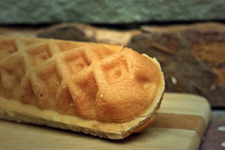 Waffle hotdog on wooden  platesの写真素材
