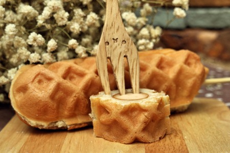Waffle hotdog on wooden  platesの写真素材