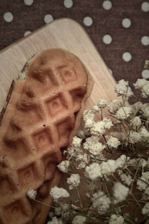 Waffle hotdog on wooden  platesの写真素材