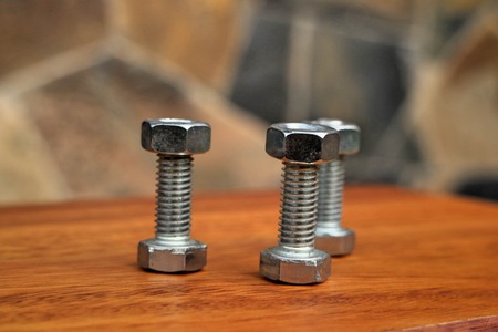 nut arrange as a heart on wood backgroundの写真素材