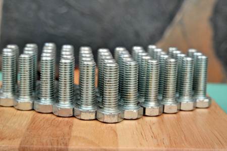 nut arrange as a heart on wood backgroundの写真素材