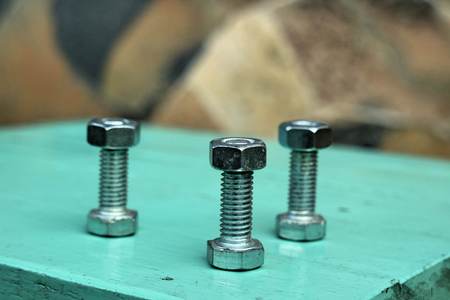 nut arrange as a heart on wood backgroundの写真素材