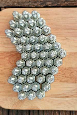 nut arrange as a heart on wood backgroundの写真素材