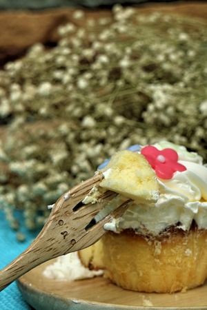cupcake delicious on wooden plates