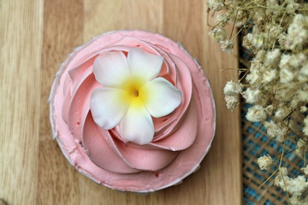 cupcake delicious on wooden platesの写真素材