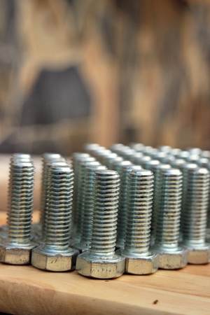 steel knots on wood backgroundの写真素材