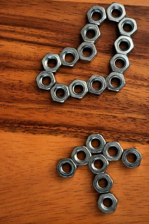 steel knots on wood backgroundの写真素材