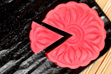 Traditional mooncakes and tea on table with teacup, Retro vintage style Chinese mid autumn festival foodsの写真素材