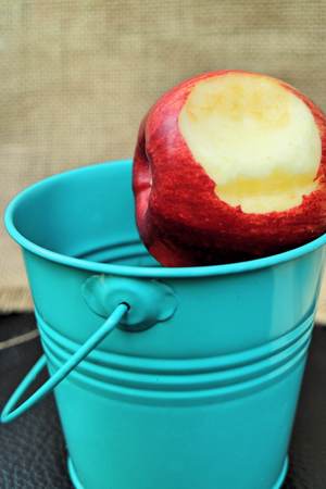 Fresh apples on wooden backgroundの写真素材