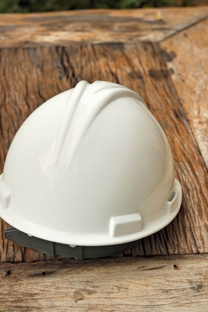 Helmet on a wooden tableの写真素材