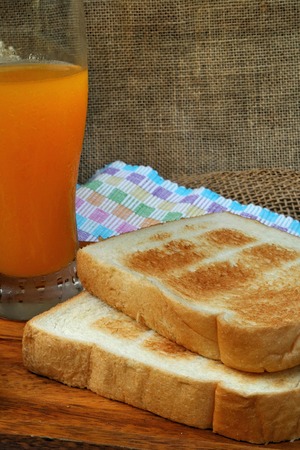 Breakfast with toast and orange juiceの写真素材