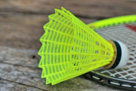 badminton nylon shuttlecock on the wooden floorの写真素材