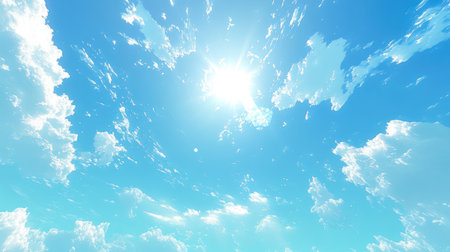 Crystal-clear blue sky with bright sunshine and wispy clouds, creating a light and airy feel.の素材