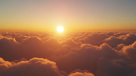 Golden hour sky with the sun low on the horizon, casting warm yellow and pink hues across thin clouds.の素材