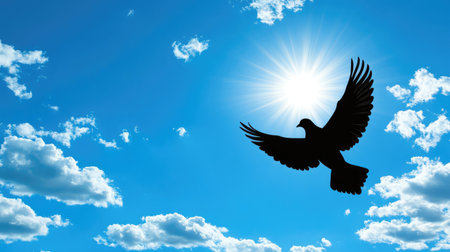 Cross with dove silhouette against a bright blue sky, ample room for peaceful messagesの素材
