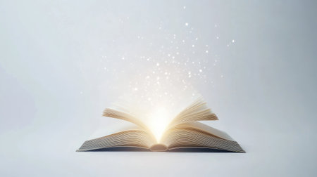 Light floating from an open book, representing futuristic technology and innovation in education, on a minimalist white backdrop.の素材