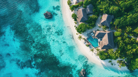 Aerial view of a luxury resort in the Mamanuca Islands, surrounded by bright turquoise waters and lush greenery. No people included.の素材