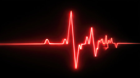 This striking image showcases a vibrant red heartbeat line against a dark background, representing vital signs and health monitoring for medical and emergency contexts.の素材