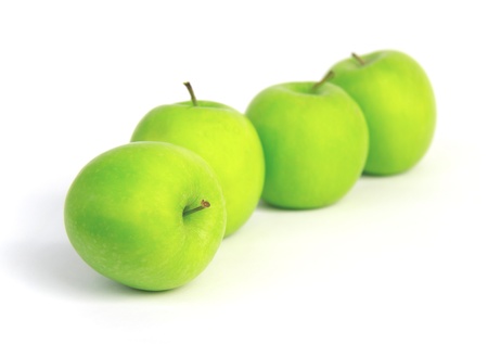 Green apple on  white backgroundの写真素材